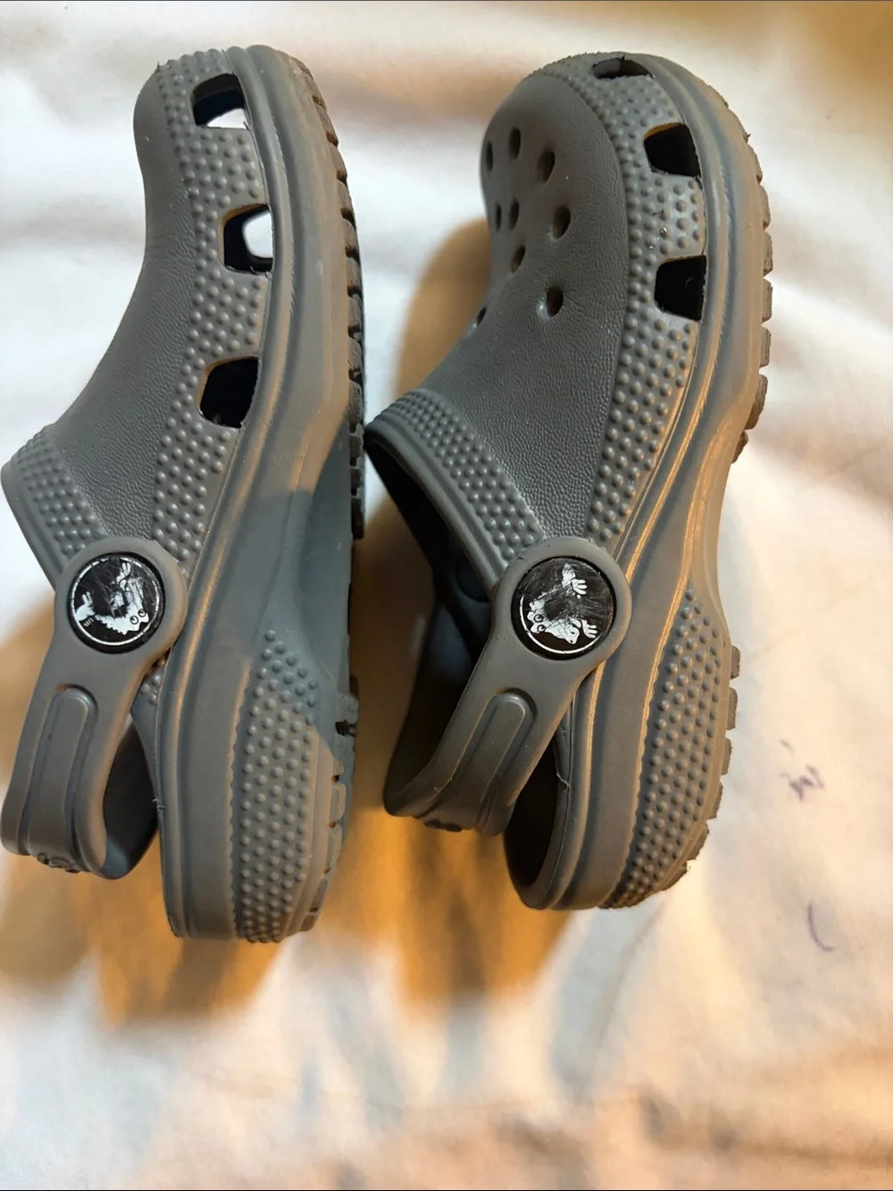 CROCS Kids' Two-Pair Set — Gray and Black with Multicolor Dino Accents